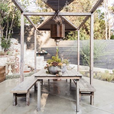 rustic outdoor party idea with dining table and benches
