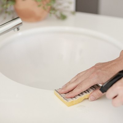 Cleaning bathroom sink area