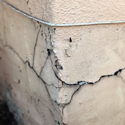 Cracked foundation corner.