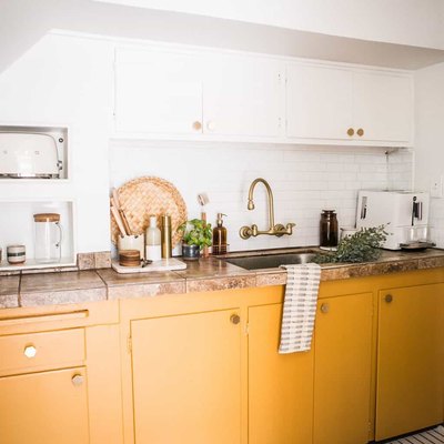 yellow kitchen color idea with white upper cabinets