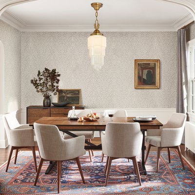 Art deco lighting in dining room with modern table and chairs