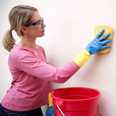 Washing walls for painting.