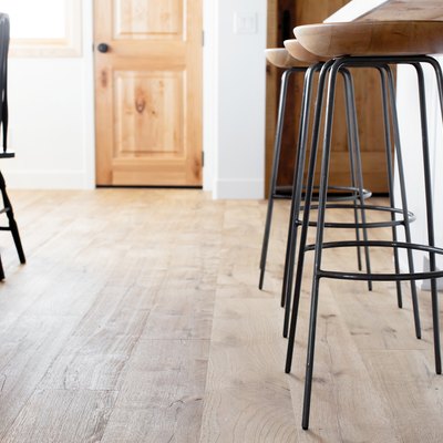 modern kitchen barstools on hardwood floor