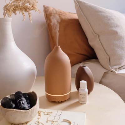 terracotta essential oil diffuser in bedroom