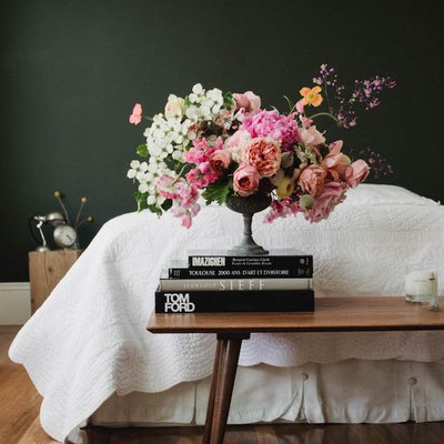 dark green bedroom with wood interiors