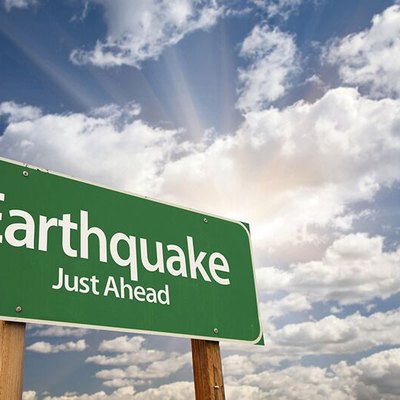 Earthquake ahead sign.