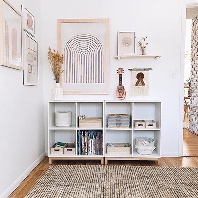 White corner featuring cubic storage and structural artwork