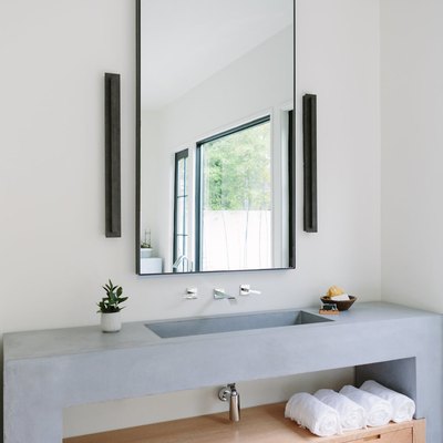 concrete open vanity in bathroom with minimalist bathroom storage