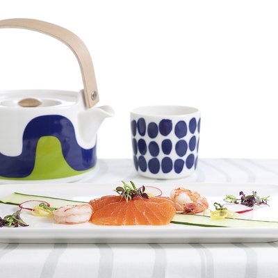 brightly-colored tea pot and cup