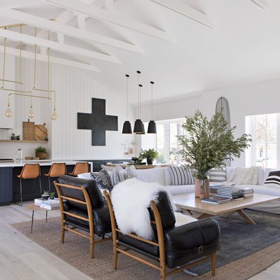 living room rug idea in open floor plan with layered sisal rug