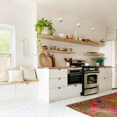 Scandinavian kitchen floor tile in white fish scale with white cabinets