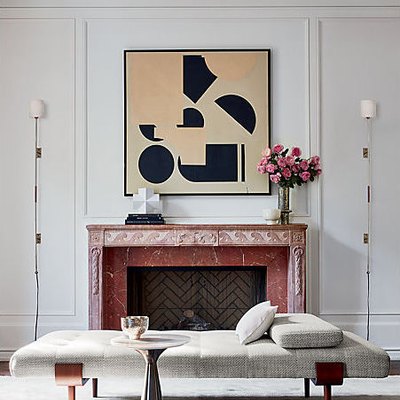 art deco apartment with white living room with fireplace and large wall art