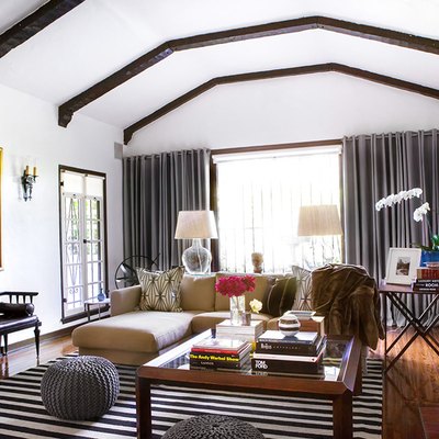white living room with exposed beams and rustic glam decor