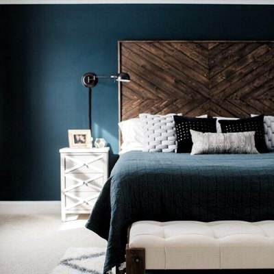 DIY rustic headboard in blue bedroom