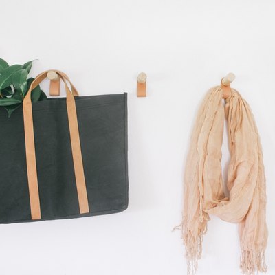 Round wall hooks with leather straps