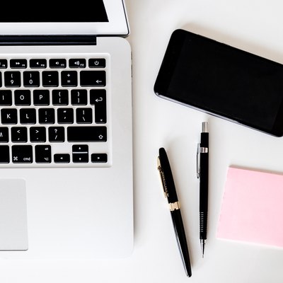 laptop and mobile phone on desk