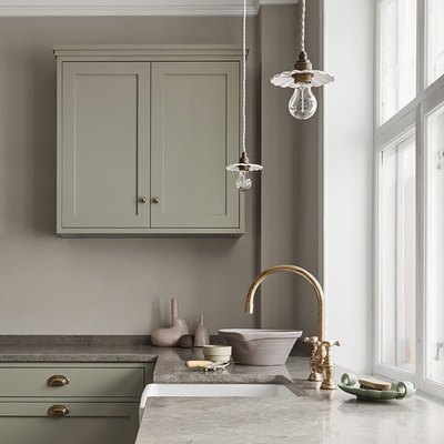 classic kitchen with beige limestone counters