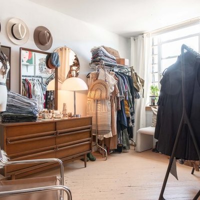 Freestanding industrial closet ideas with MCM dresser