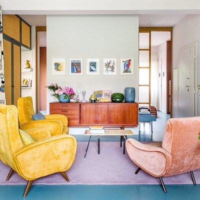 colorful maximalist living room with blue floors