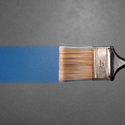 Paintbrush lays a clean line of paint.