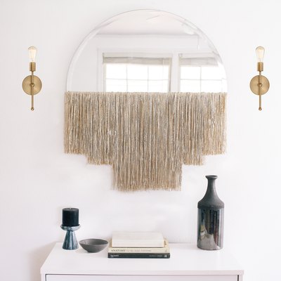 Half moon fringe mirror