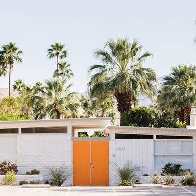 white midcentury modern exteriors with orange doors