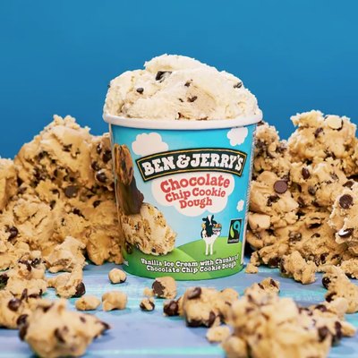 pint of ben & jerry's chocolate chip cookie dough ice cream surrounded by cookie dough