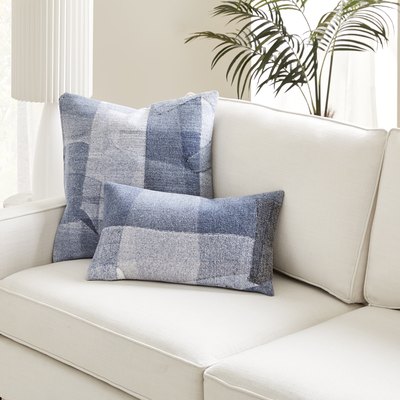 white sofa with denim pillows