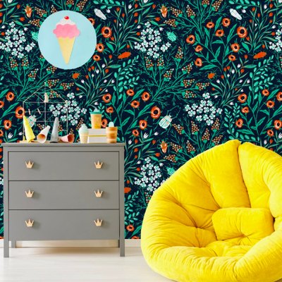 dresser and yellow chair near wall with floral wallpaper