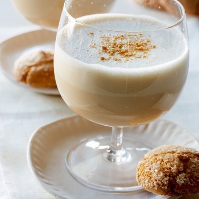 two drinks and cookies on plates