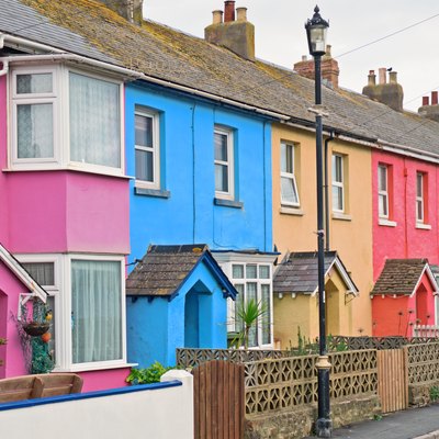 A section of colorful terraced housing in a west country seaside town, UK