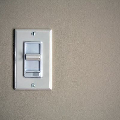 Contemporary dimmer switch on wall