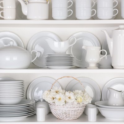 White Plates in Cupboard