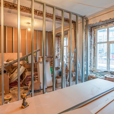 Interior of apartment during on the renovation and construction ( making wall from gypsum plasterboard)