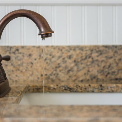 Bronze faucet and sink