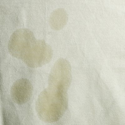 Oil stain on white cloth