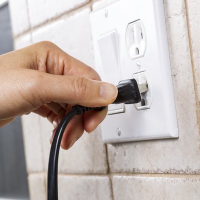 Plugging into Electrical Outlet