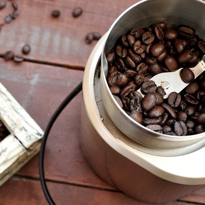 Electric coffee grinder with roasted coffee beans