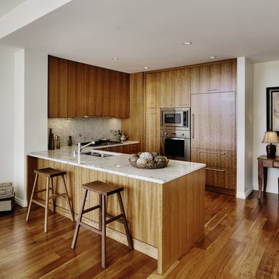 Wood cupboards in modern kitchen