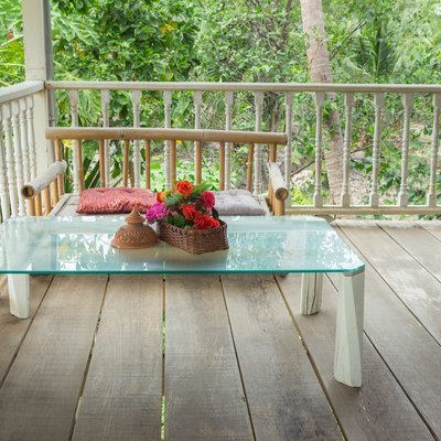 Thai-style seating on balcony in garden house