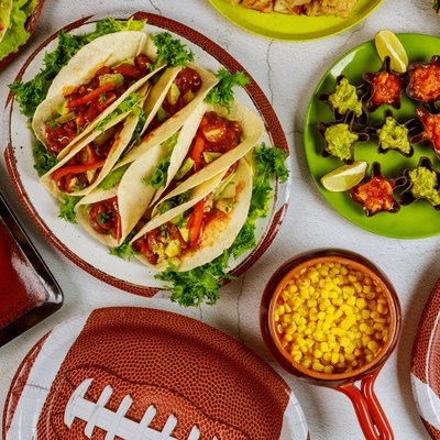 Party table for watching american football game. Mexican cuisine.