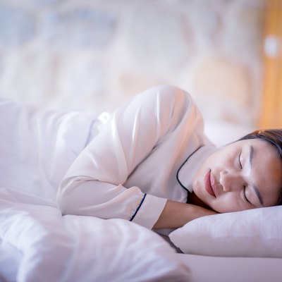 Woman sleep on a pillow.