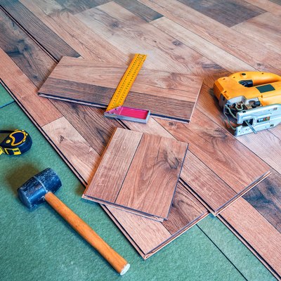 Carpentry tools on laminated floor.