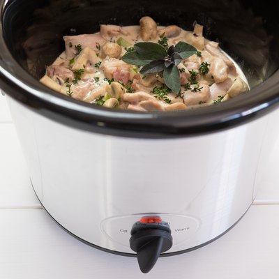 Slow cooker crockpot meal with chicken and herbs