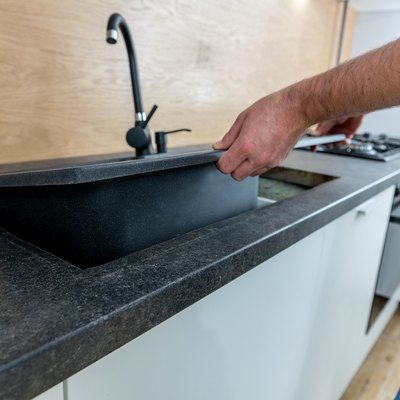Installing a new ceramic sink in kitchen