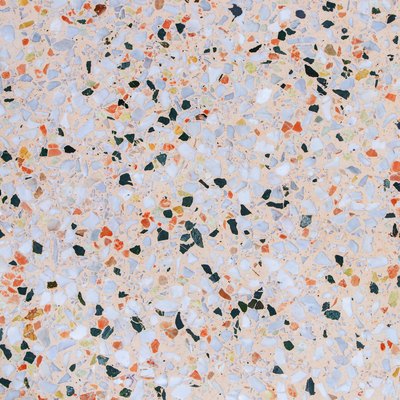 terrazzo floor, polished stone wall texture yellow and many colors. beautiful background with copy space add text