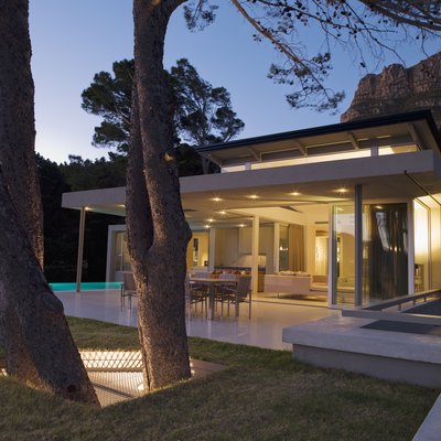 Patio area and glass walls of modern home