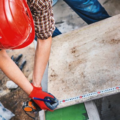 Installing ceramic tiles.