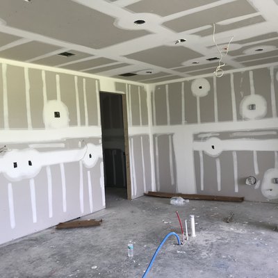 Home Construction: Drywall being installed