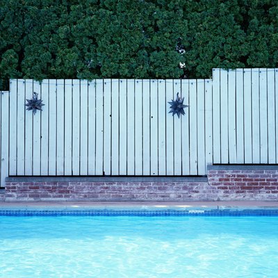 Fence alongside swimming pool
